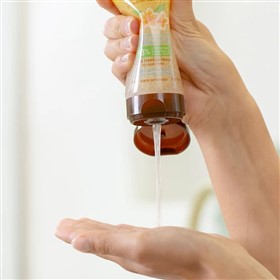 اسکراب بدن گل یاس و نارگیل مونوی اولودرم Evoluderm Monoi حجم 150 میلی لیتر