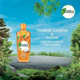 روغن موی نرم کننده و درخشان کننده بادام واتیکا Vatika Almond Soft Shine حجم 300 میلی لیتر